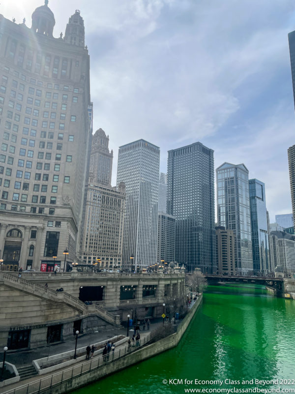 a river with green water in a city