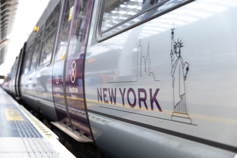 a train with a statue of liberty on it