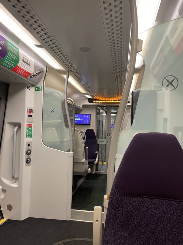 a train with seats and doors