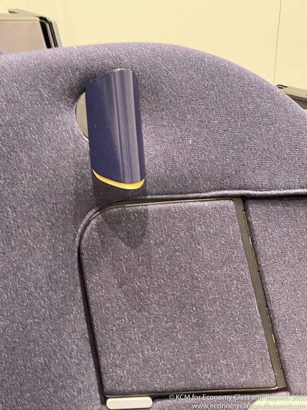 a blue object on a chair