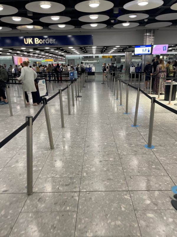 a line of barriers in a airport