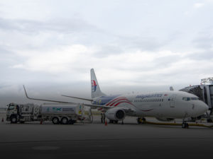 a large airplane parked on a runway