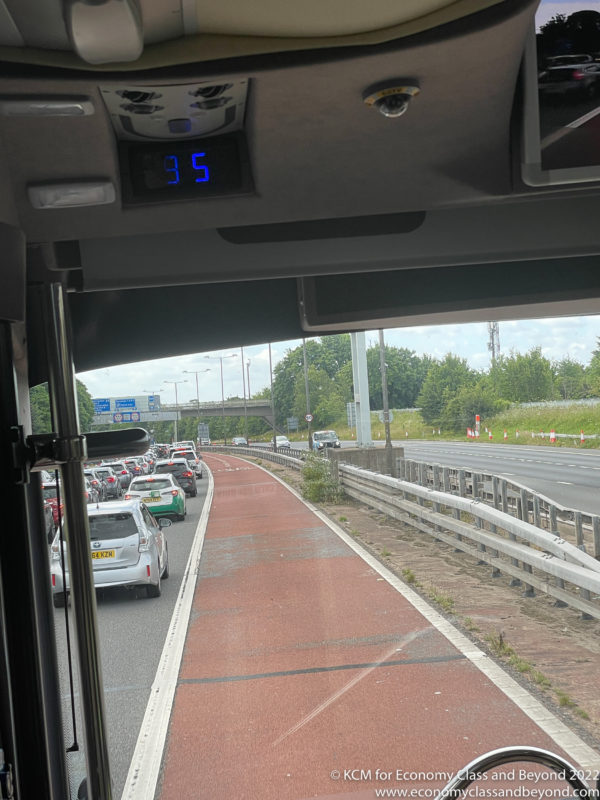 a view from a bus window of a traffic jam