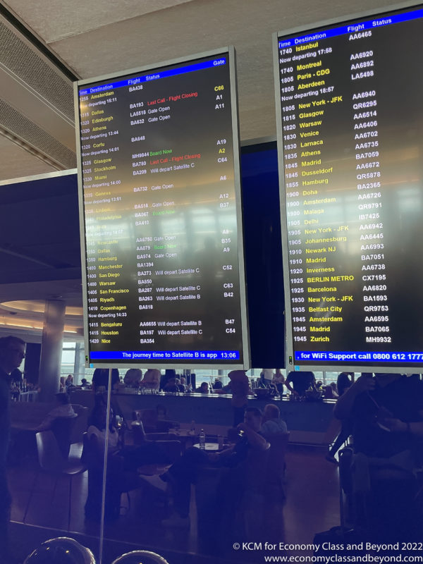 a screens with text and images of people sitting at tables