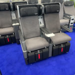 a group of grey and black seats