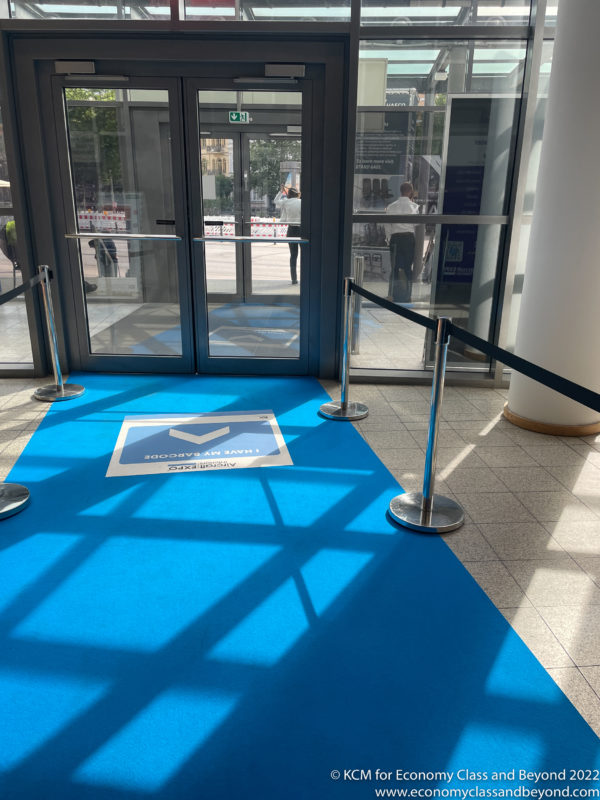 a blue carpet with a rope around it
