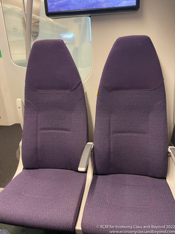 a pair of purple seats