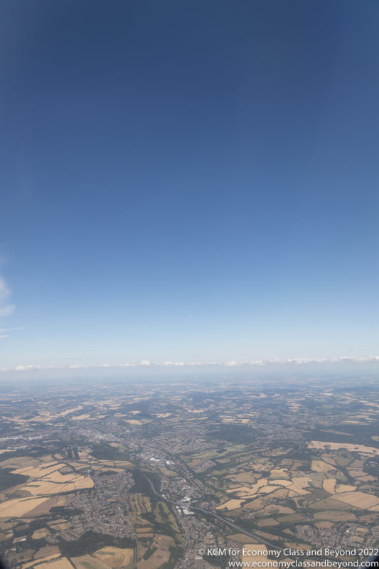 aerial view of a landscape with a blue sky