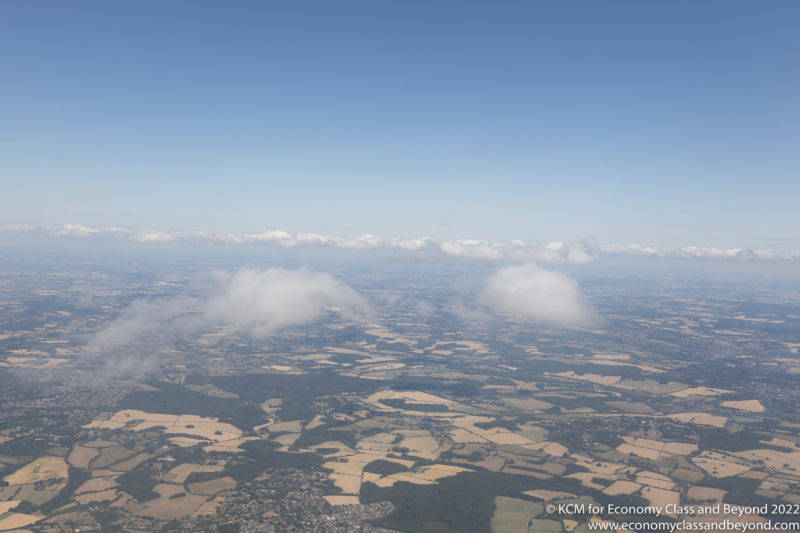 aerial view of a landscape with clouds