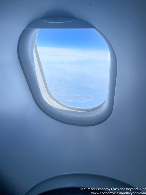 a window with a blue sky