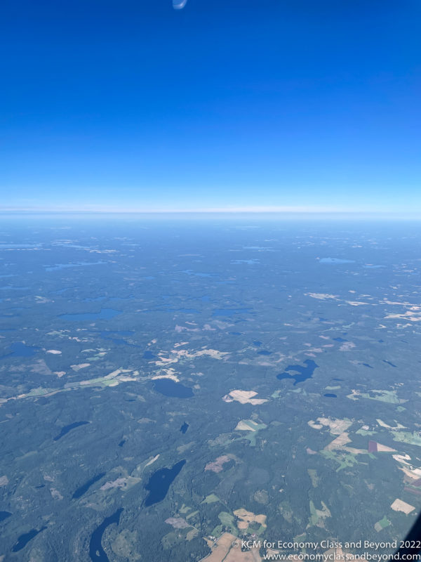 aerial view of land and blue sky