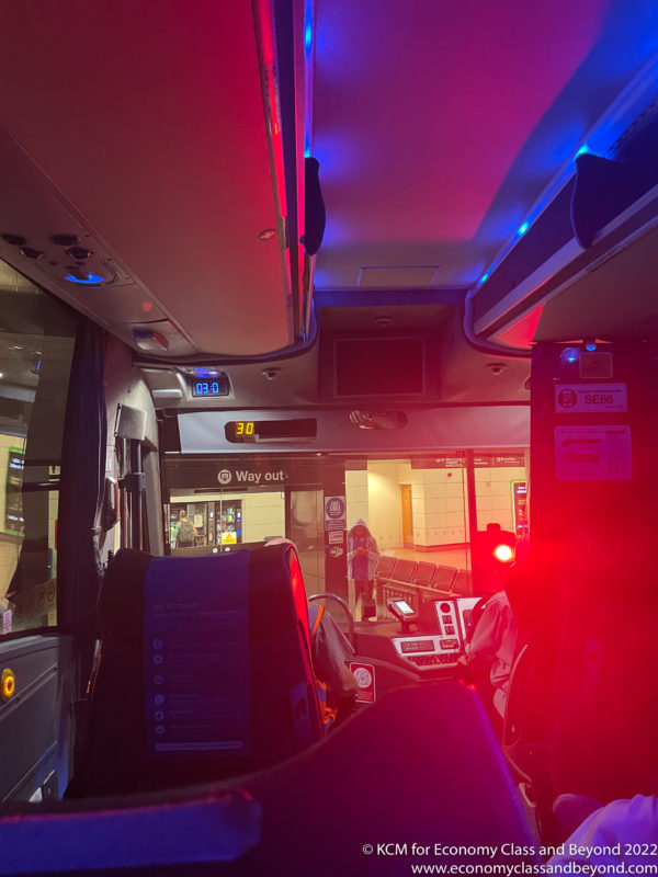 inside a bus with a red light