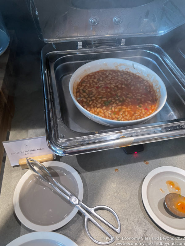 a bowl of beans in a tray
