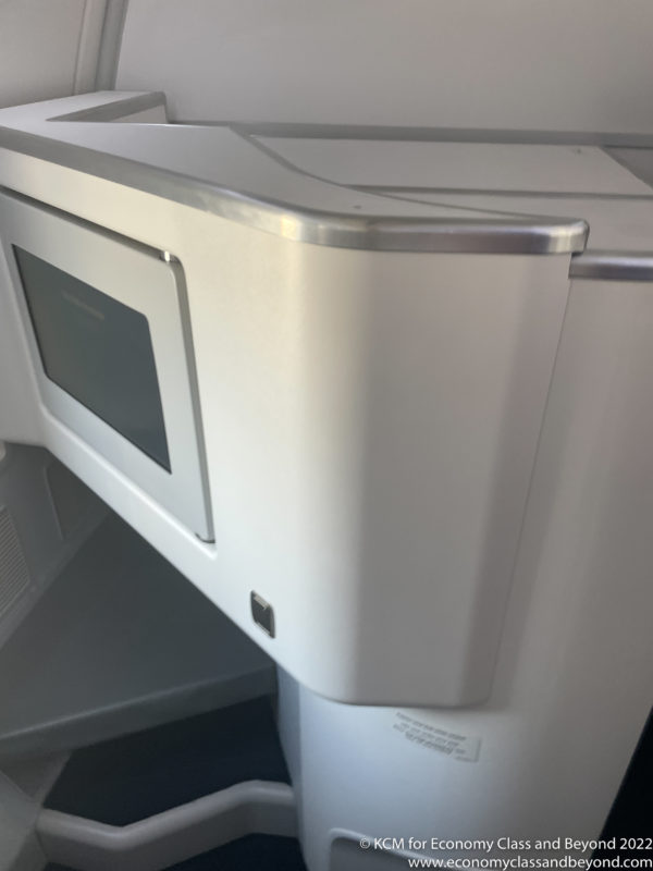 a white microwave on a plane