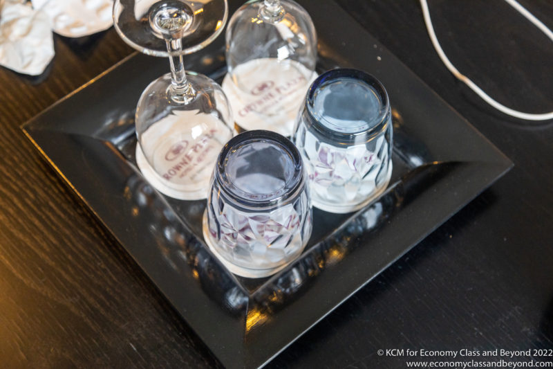 a tray with wine glasses on it