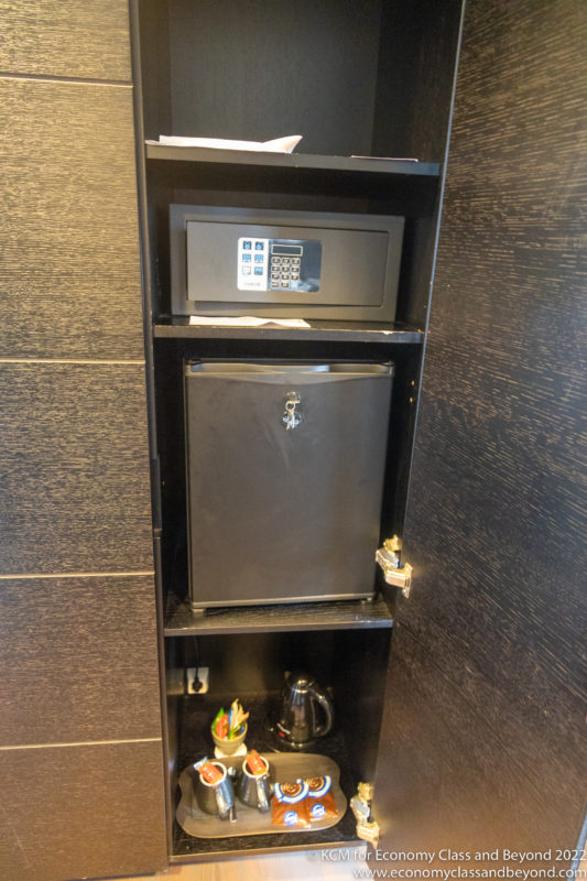 a small metal safe in a shelf