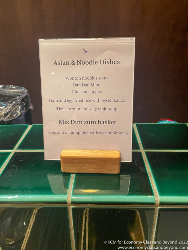 a menu on a green tile counter