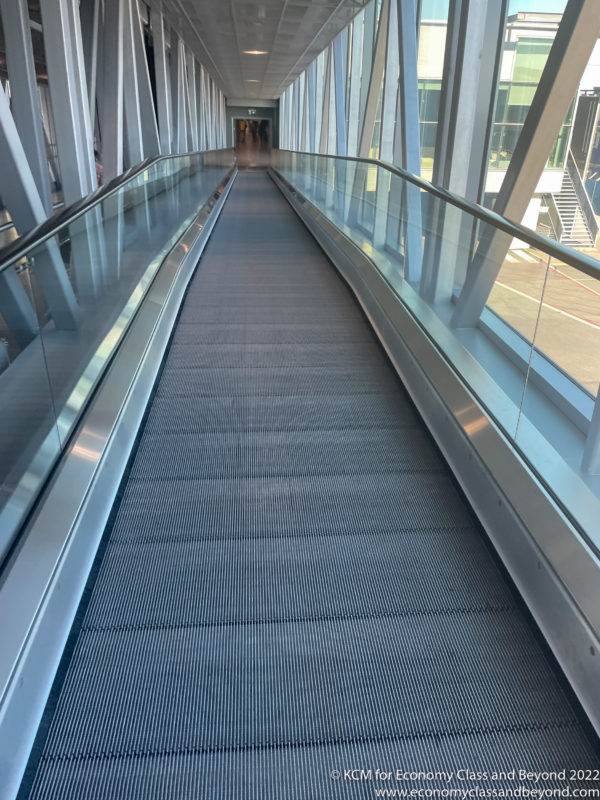 a moving walkway in a building
