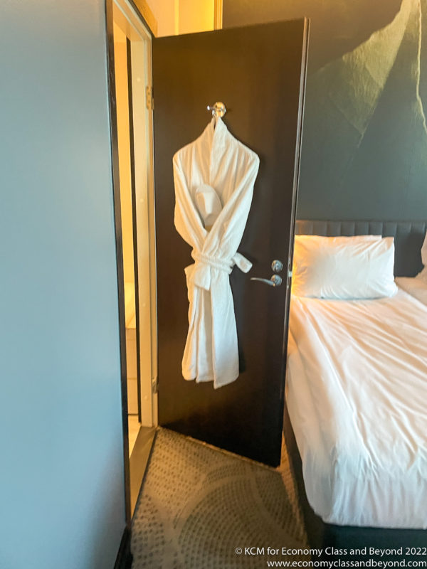 a white robe on a door