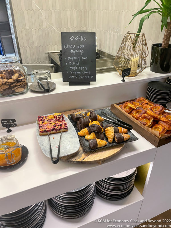 a counter with pastries and pastries on it