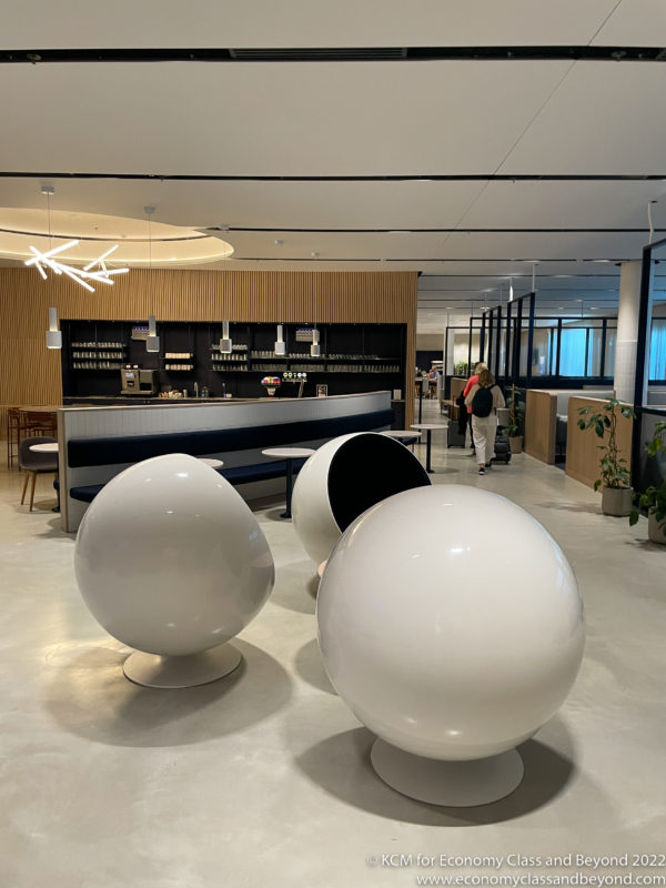 a group of white spheres in a room