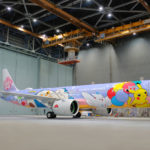 a plane with cartoon characters painted on it