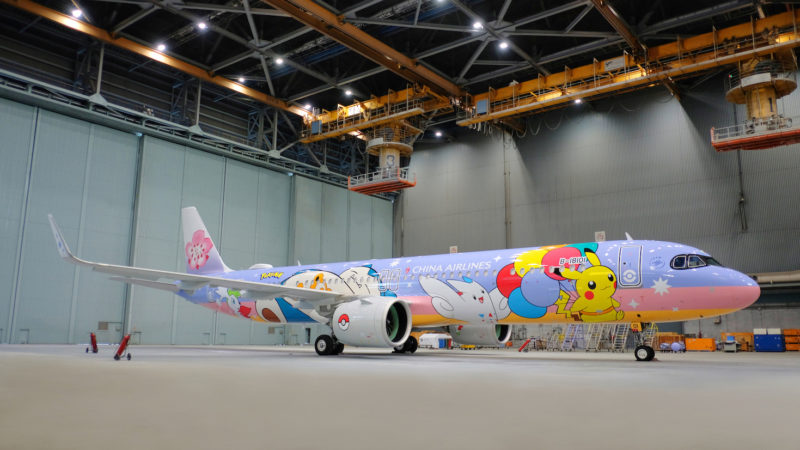 a large airplane with cartoon characters on it