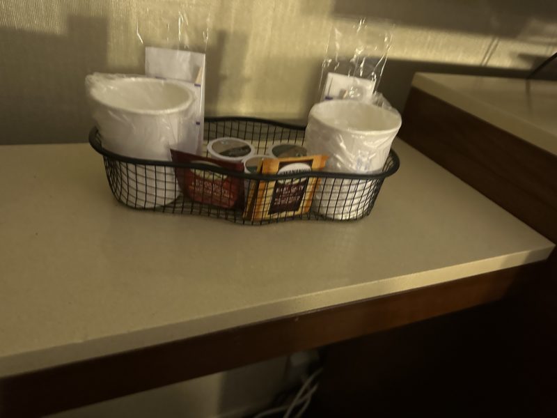 a basket of coffee and tea items