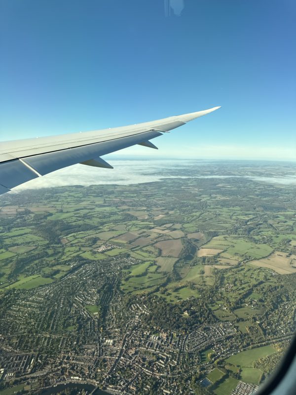 an airplane wing and landscape