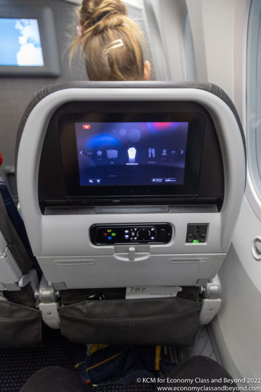 a screen on the back of a seat