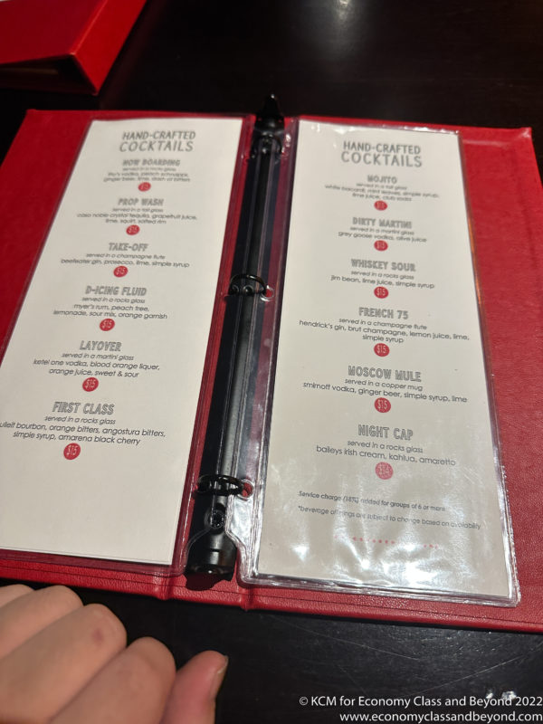 a menu in a red cover