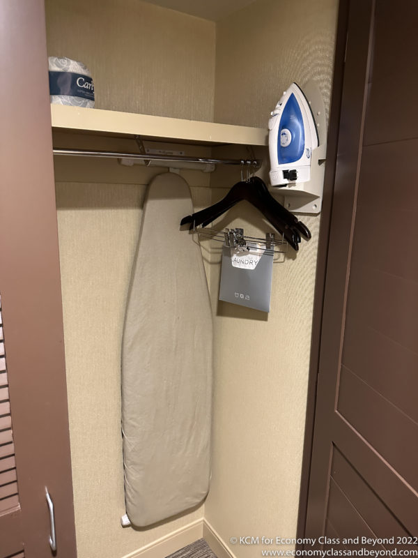 a ironing board in a closet