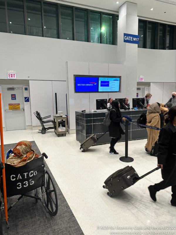 people with luggage in an airport