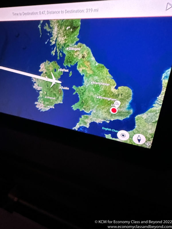 a map of the united kingdom with an airplane flying
