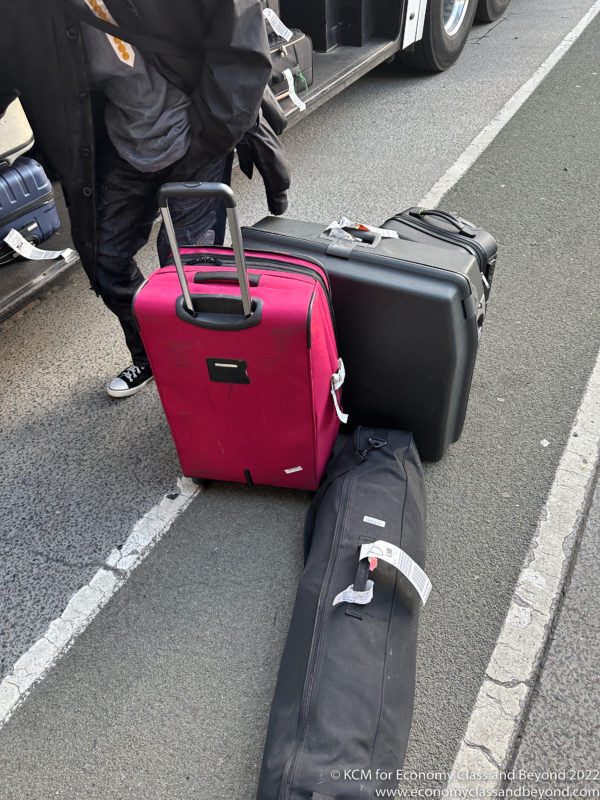 a group of luggage on the street