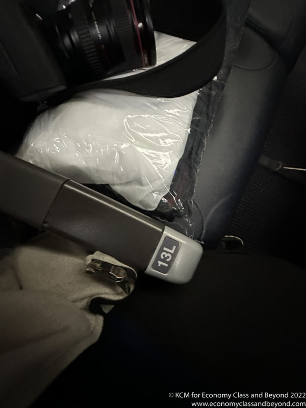 a seat belt with a seat belt in a plastic bag