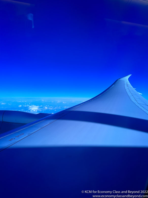 wing of an airplane in the sky