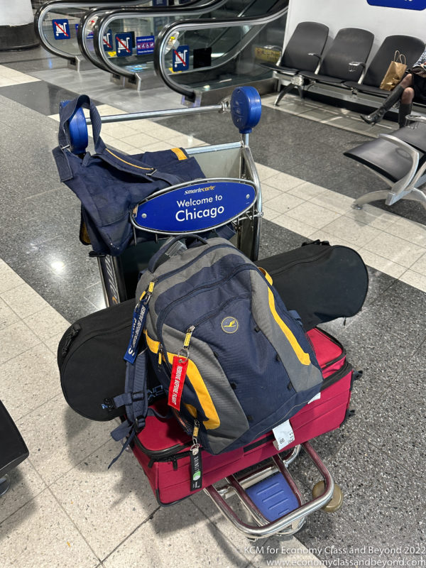 luggage on a cart in an airport