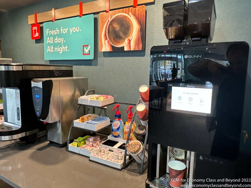a coffee machine and a sign