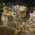 a wooden cart decorated with lights