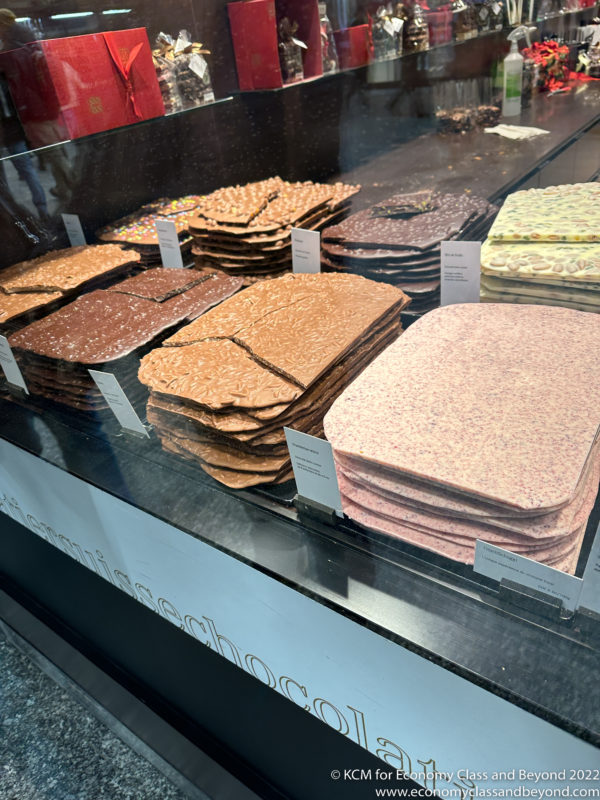 a display case with different types of chocolate