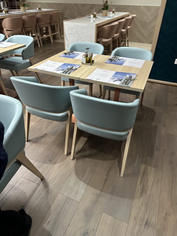 a table with chairs in a restaurant