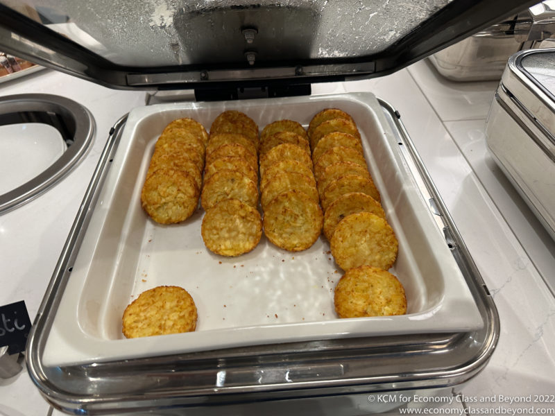 a tray of potato patties