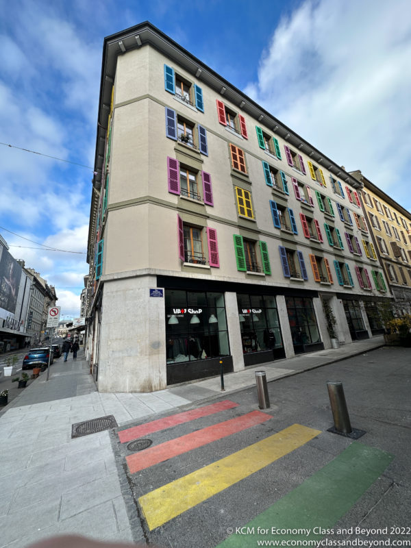 a multicolored building with windows