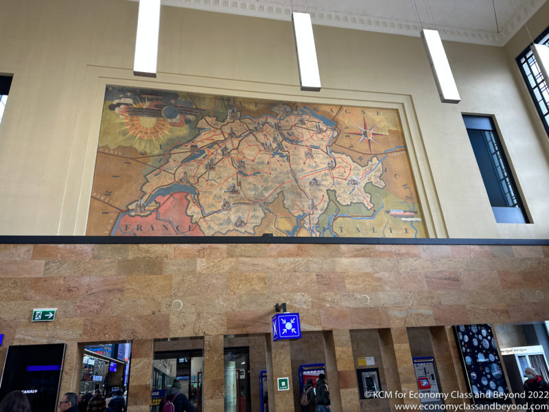 a large map on the wall of a building