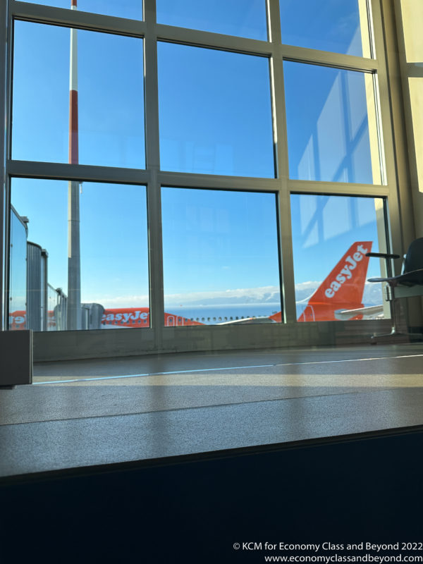 an airport with an airplane in the window