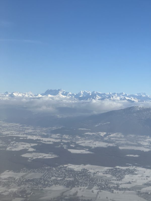a landscape with snow covered mountains