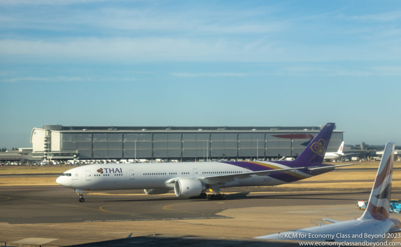 Thai Airways Boeing 777-300ER taxiing at London Heathrow Airport- Image, Economy Class and Beyond