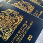 a group of black and gold passport