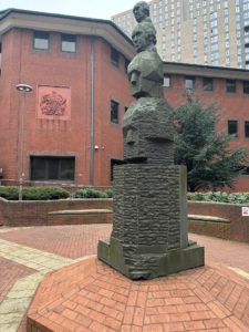 a statue of a man in a courtyard